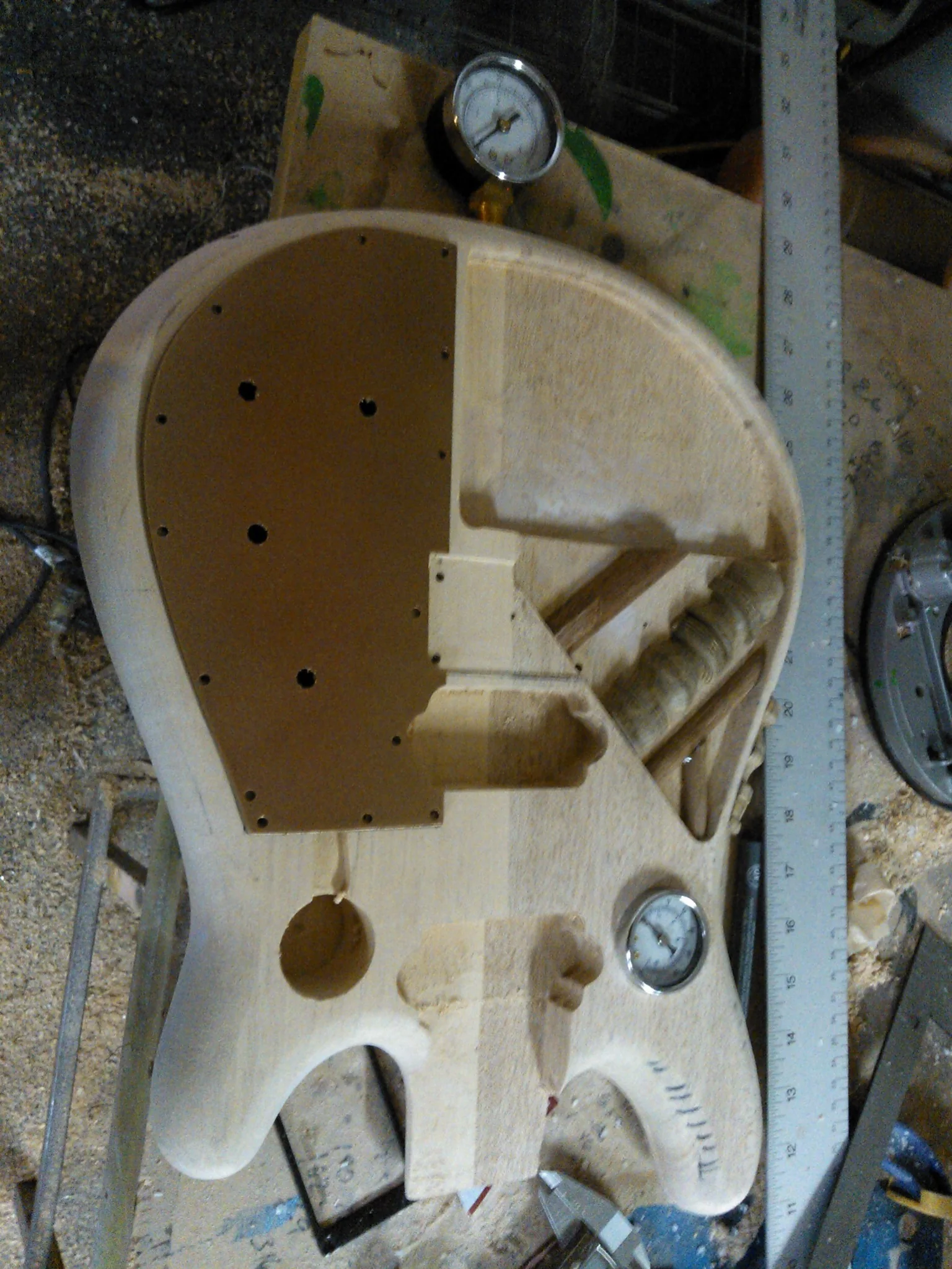 Steampunk guitar body routed for pipes electronics and controls